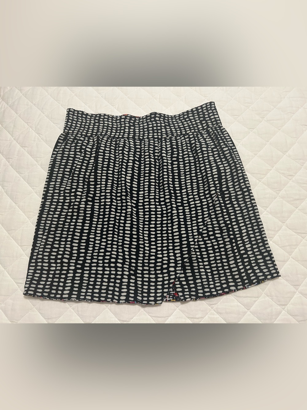 Reversible Black and White Dot-Print Elastic Waist Mini Skirt with faux wrap